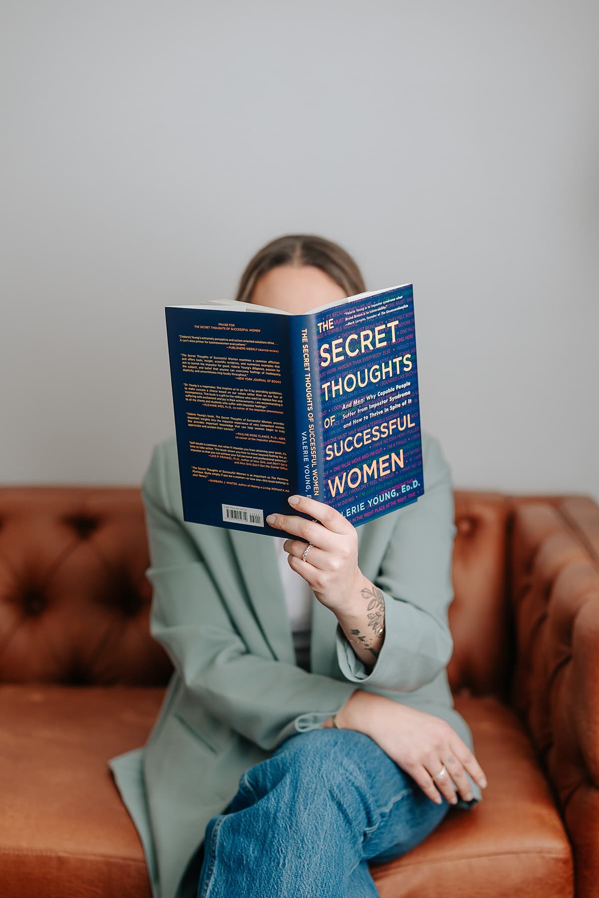 Marissa Esposito reading The Secret Thoughts of Successful Women as part of a daily mental fitness leadership practice.